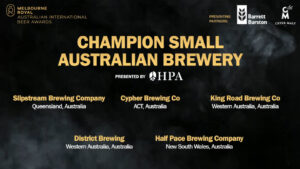 Screenshot from the 2026 Australian International Beer Awards presentation, showing the contenders for the Champion Small Australian Brewery category in white and gold text over a smokey black background
