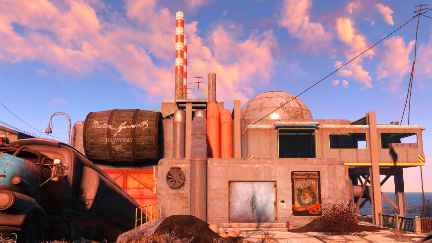 Screenshot from Fallout 4, showing the exterior of the Gwinnett Brewery, mostly intact with some debris outside